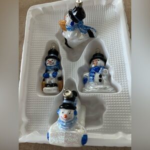 Set of (4) 2001 Target decorated iridescent glass snowman ornaments